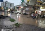 City drenched by drizzling rain, water filled in houses and shops, jam in the way of colonies