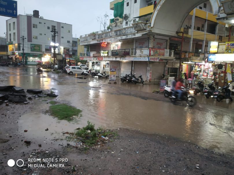 City drenched by drizzling rain, water filled in houses and shops, jam in the way of colonies